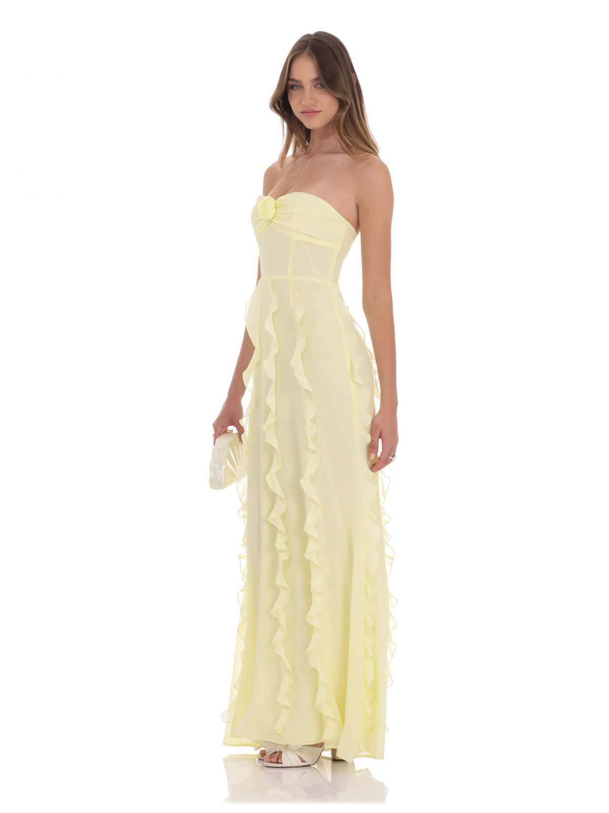 Yellow strapless A-line maxi chiffon dress with rosette detail and ruffled tier skirt