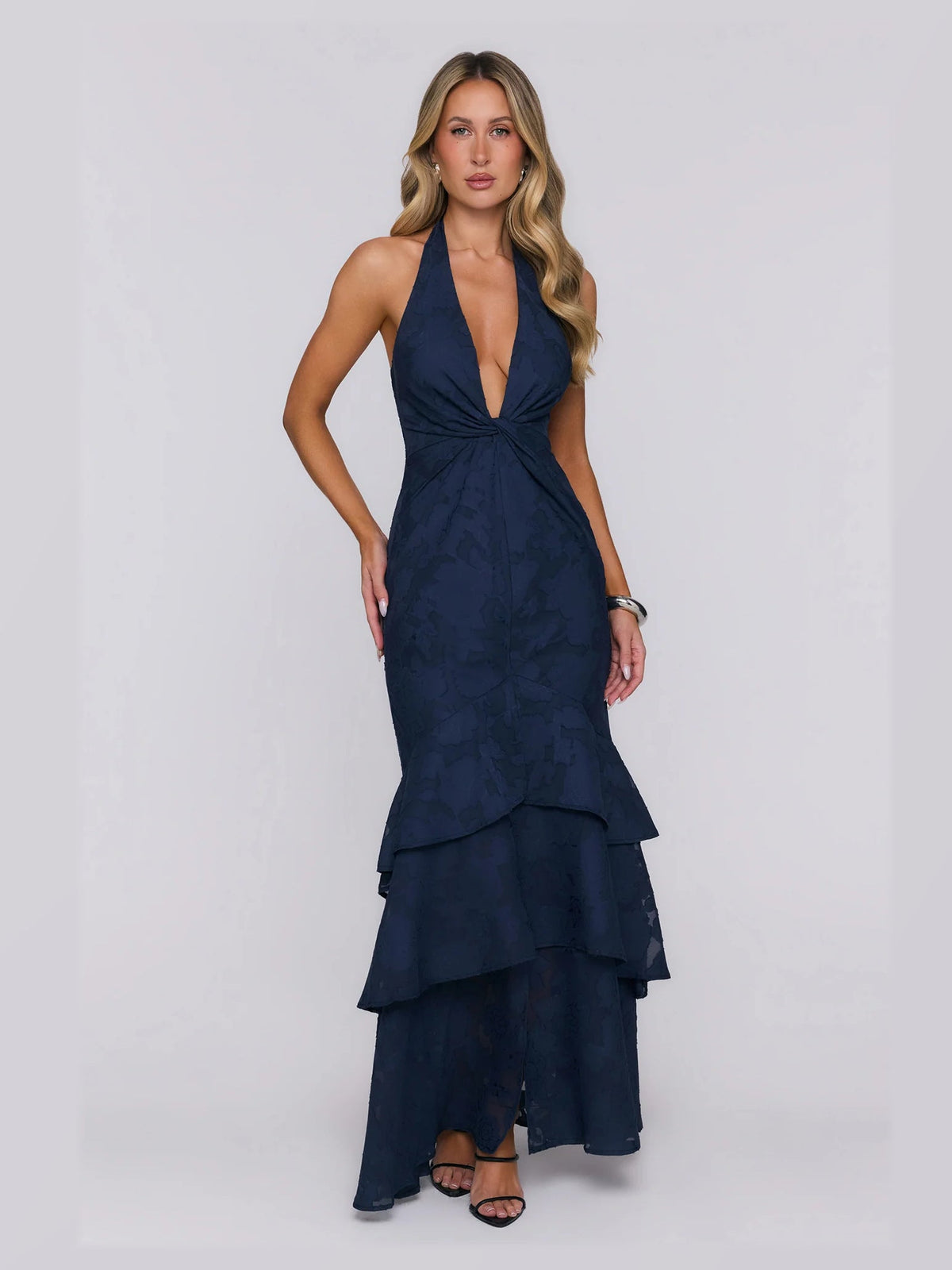 Navy formal dress with structured woven fabric construction and maxi hem