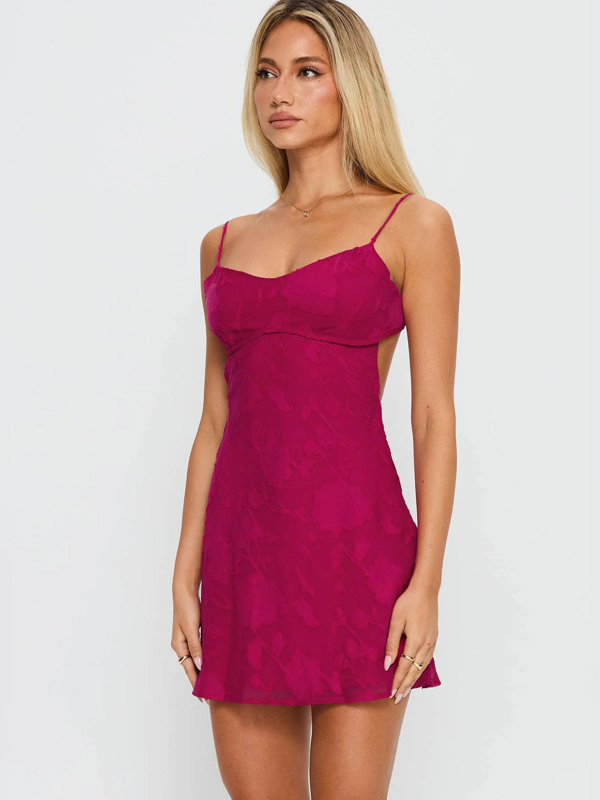 Hot pink fitted mini dress with sweetheart bodice and thin spaghetti straps