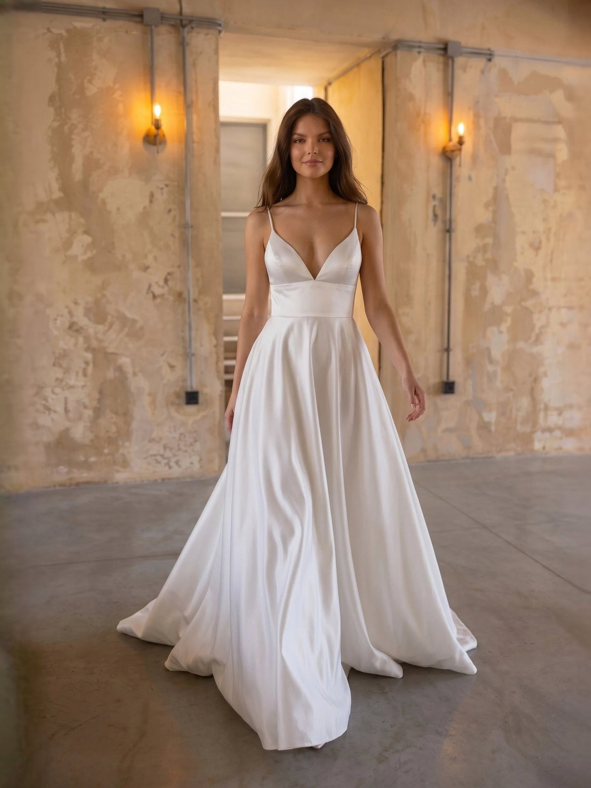 Ivory satin wedding dress with V-neck bodice and gathered A-line skirt, floor length