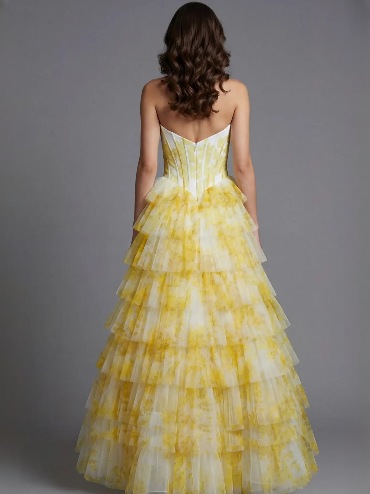 Yellow sweetheart corset A-line tulle prom dress with tiered ruffles, open-back view