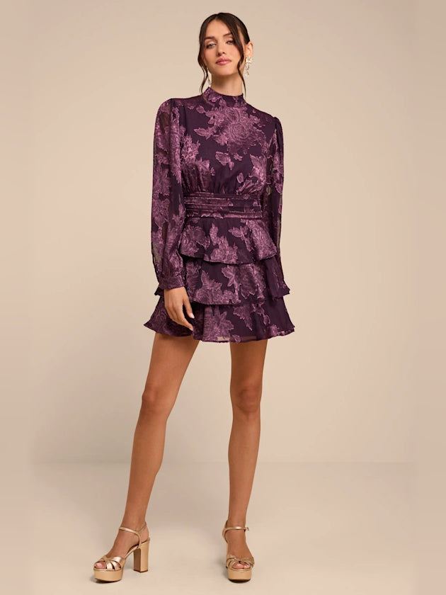Purple floral tiered mini dress with high neck, long sleeves, and layered ruffle skirt