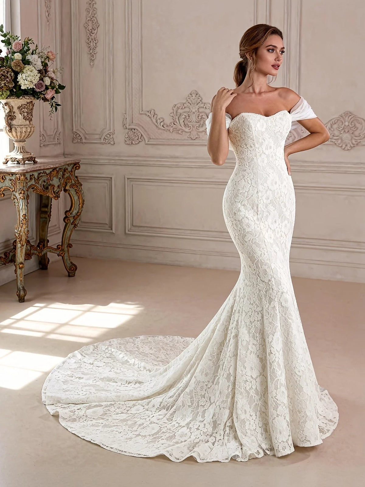 Ivory off-shoulder sweetheart lace gown with fitted mermaid silhouette and flowing train