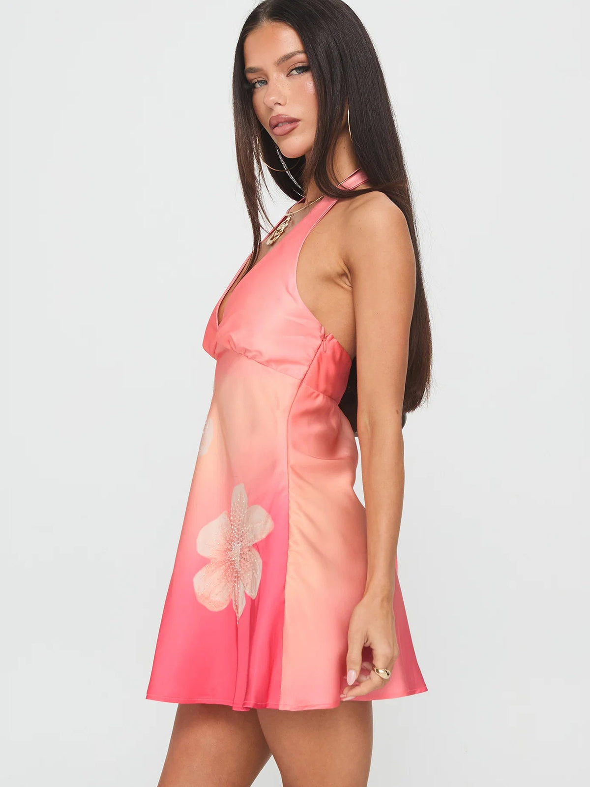 Halter neck mini dress with beaded neckline and floral print in pink and coral tones
