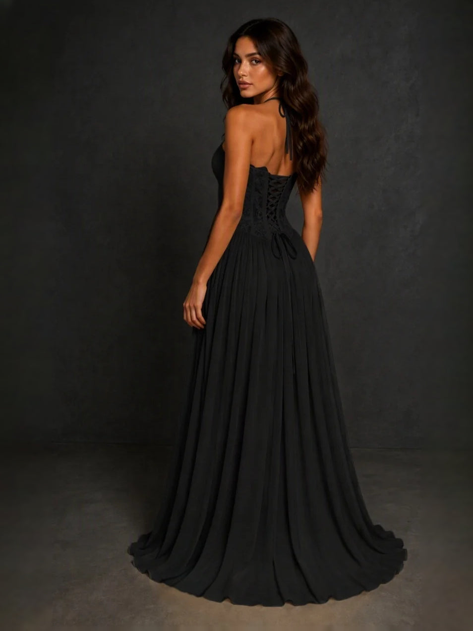 Black sweetheart A-line prom dress with lace bodice and flowing pleated skirt
