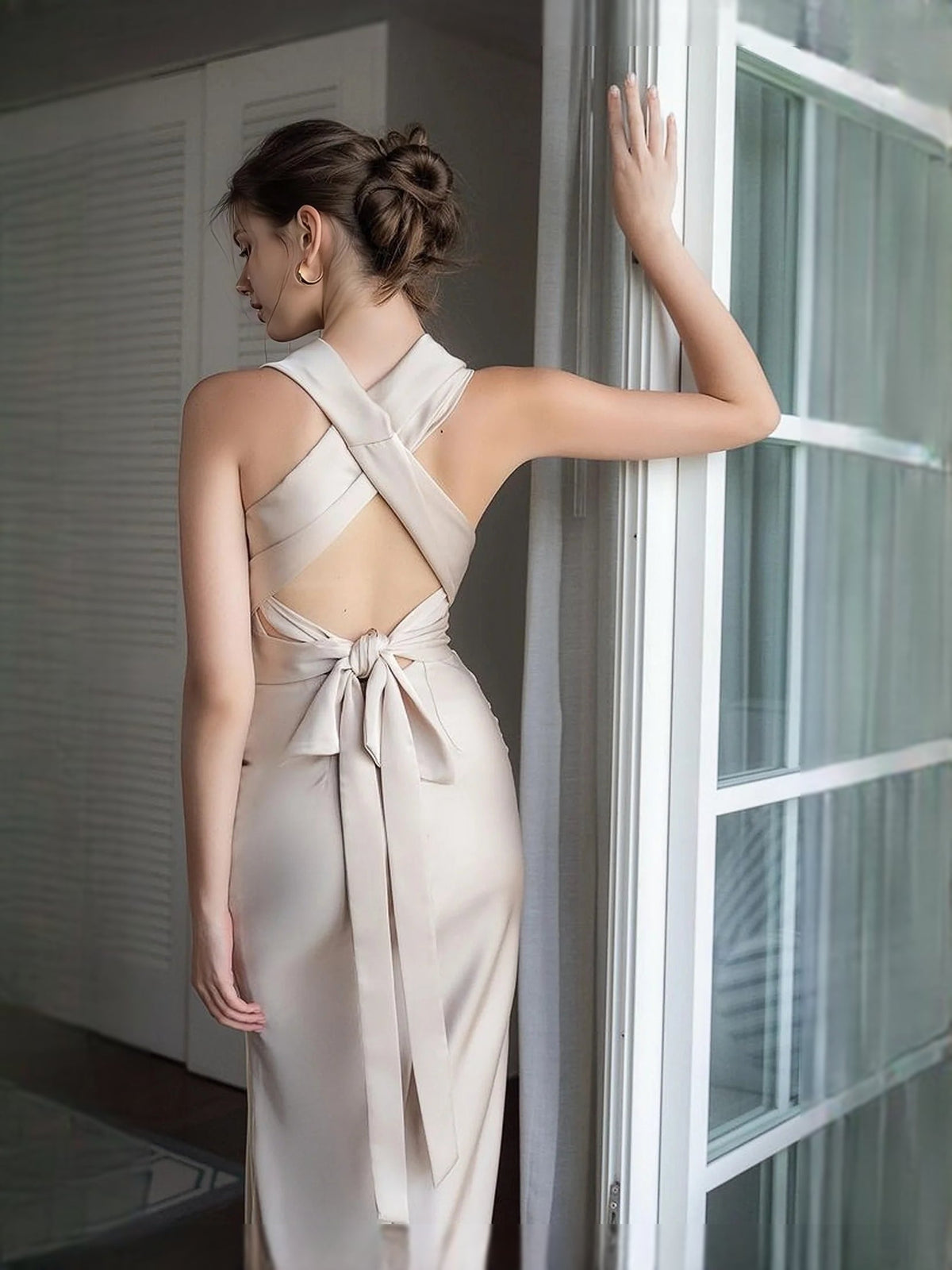 Beige satin prom dress, open back with cross straps and tied bow, mermaid maxi