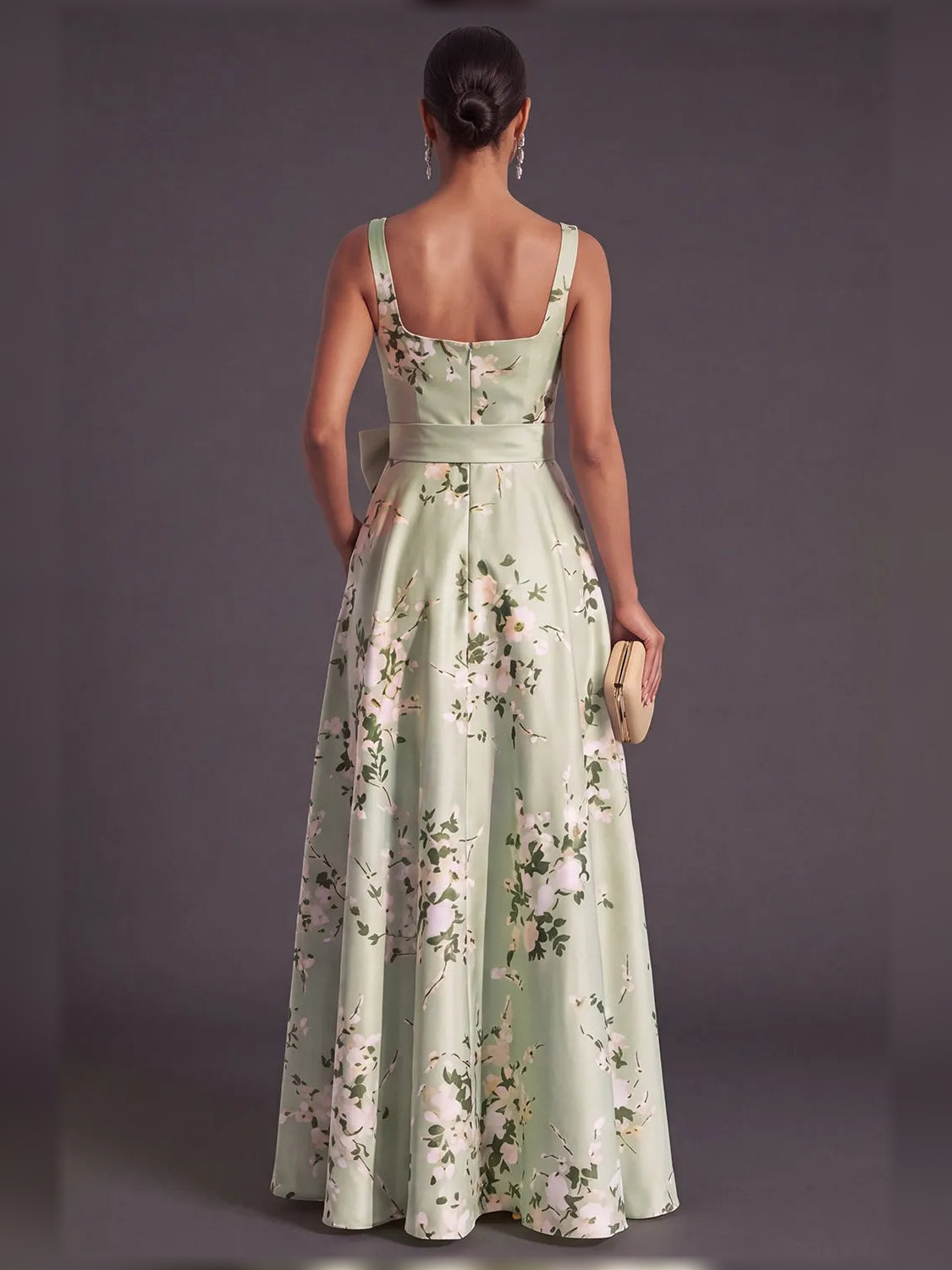 Sage green floral A-line formal dress with spaghetti straps and open back