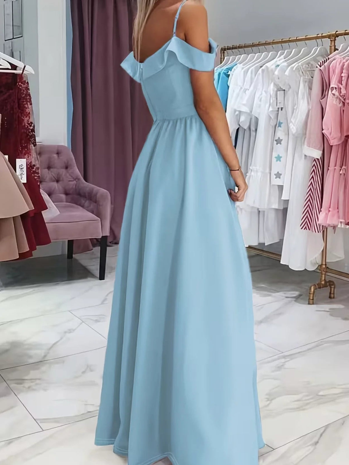 Light blue satin A-line gown, V-neck with ruffled shoulders, open back, thigh slit