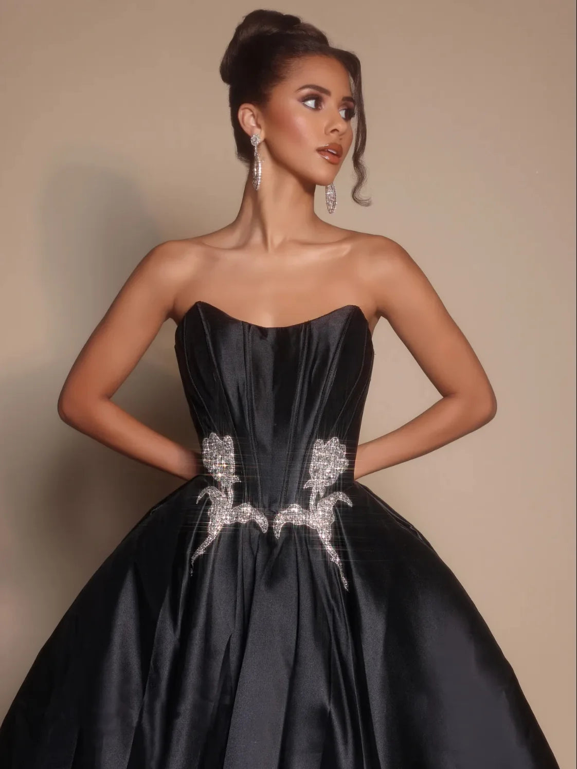 Black strapless satin bodice with rhinestone floral waist panel and full skirt