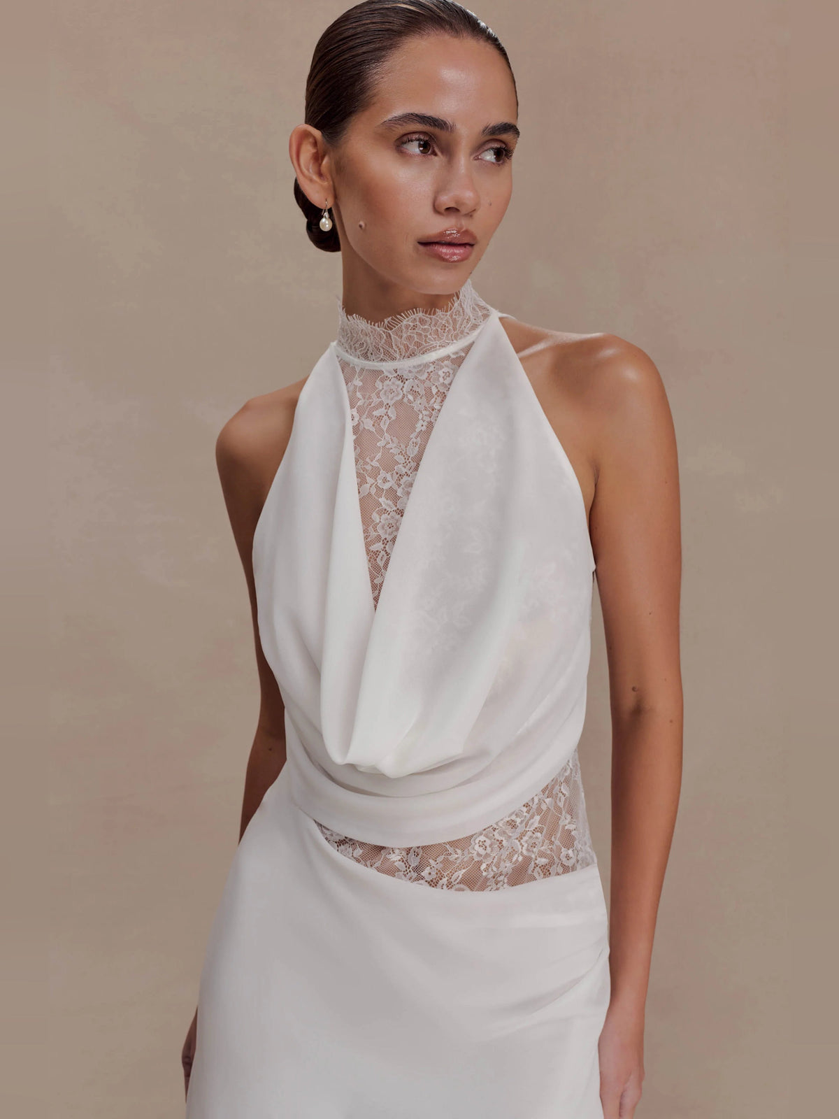 White halter-neck mini dress with draped chiffon front and lace sheer yoke