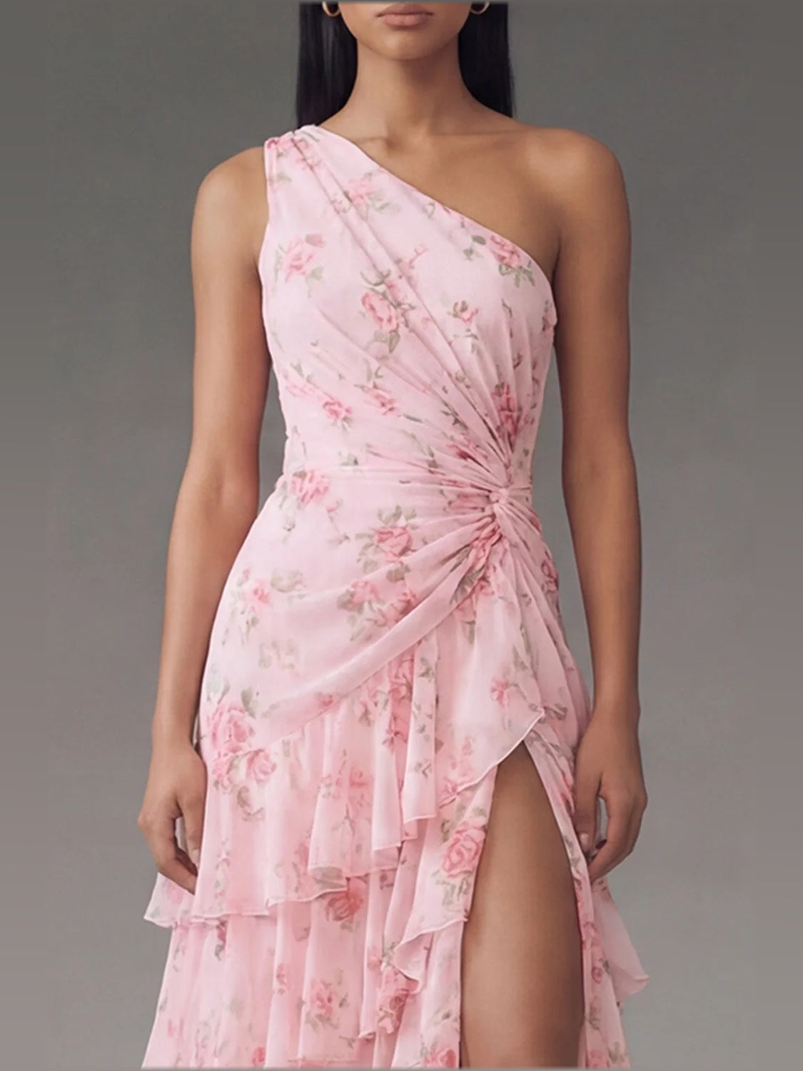 Light pink floral one-shoulder draped maxi dress with tiered ruffles and side slit