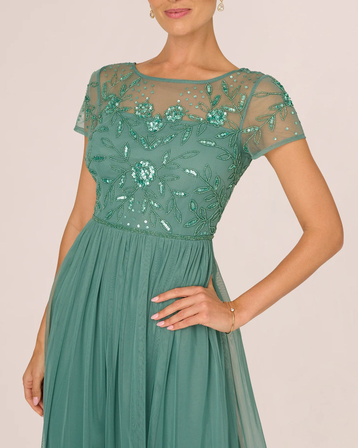 Seafoam green beaded short-sleeve illusion bodice with floral vine detail