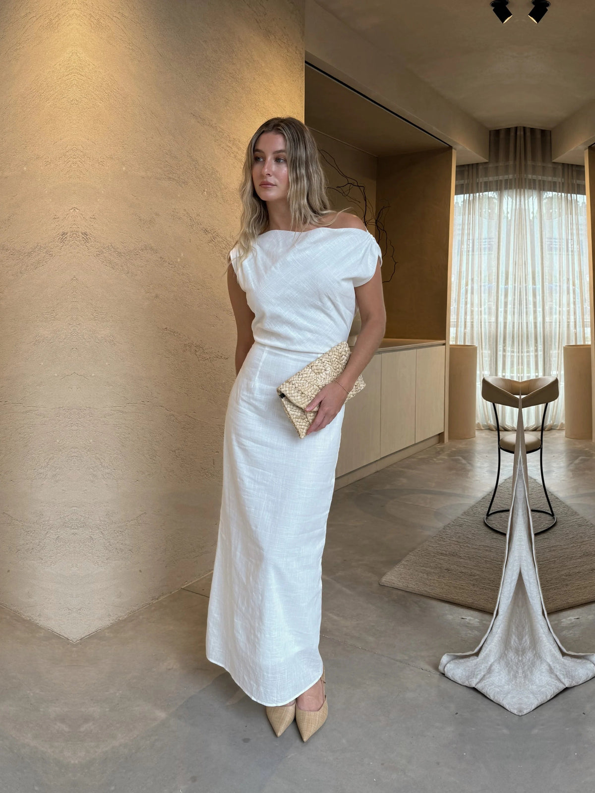 White sheath maxi formal dress with off-the-shoulder neckline, alternate view showing the bodice