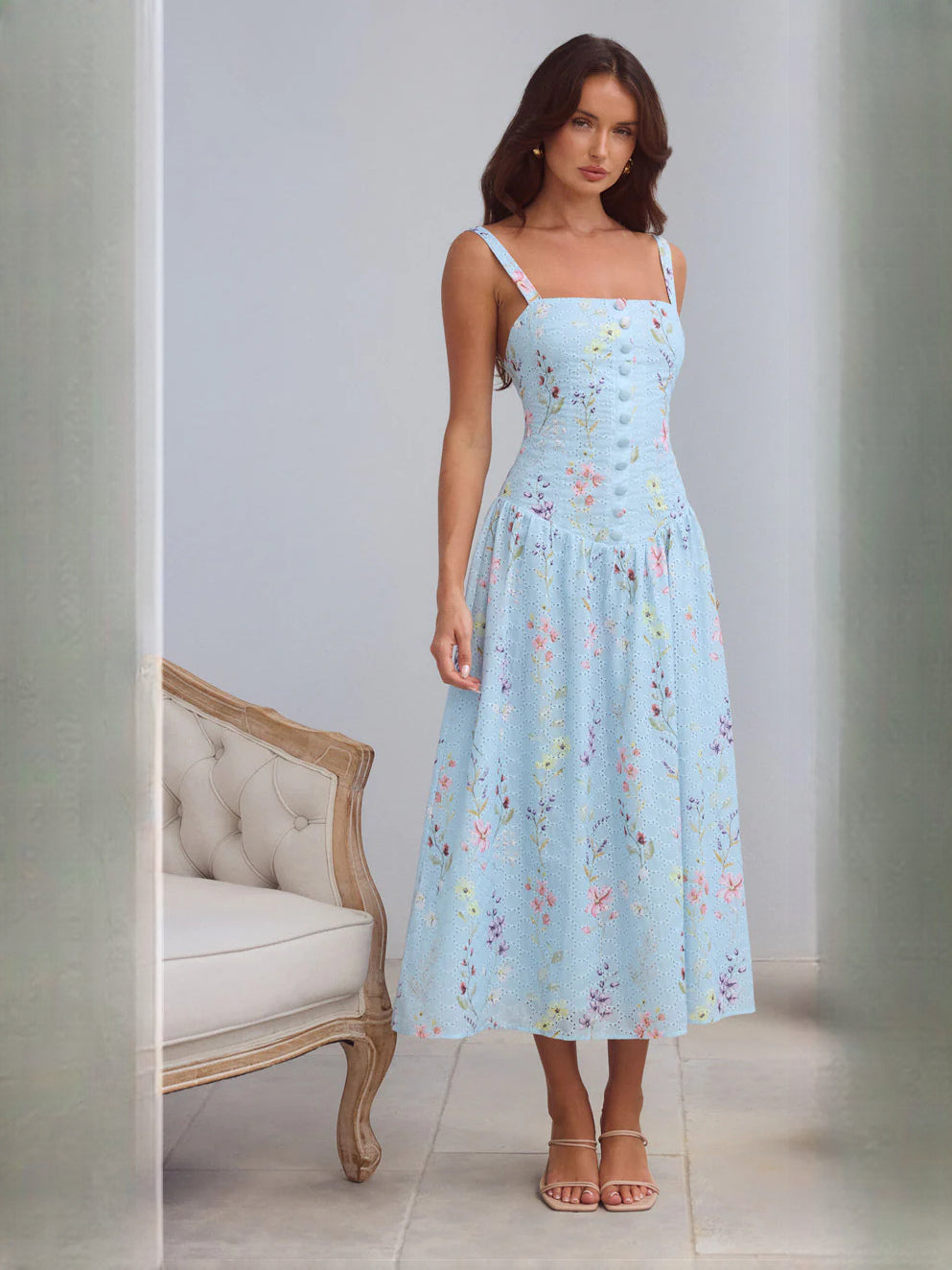 Blue a-line maxi formal dress with floral print, alternate full-length view showing the bodice