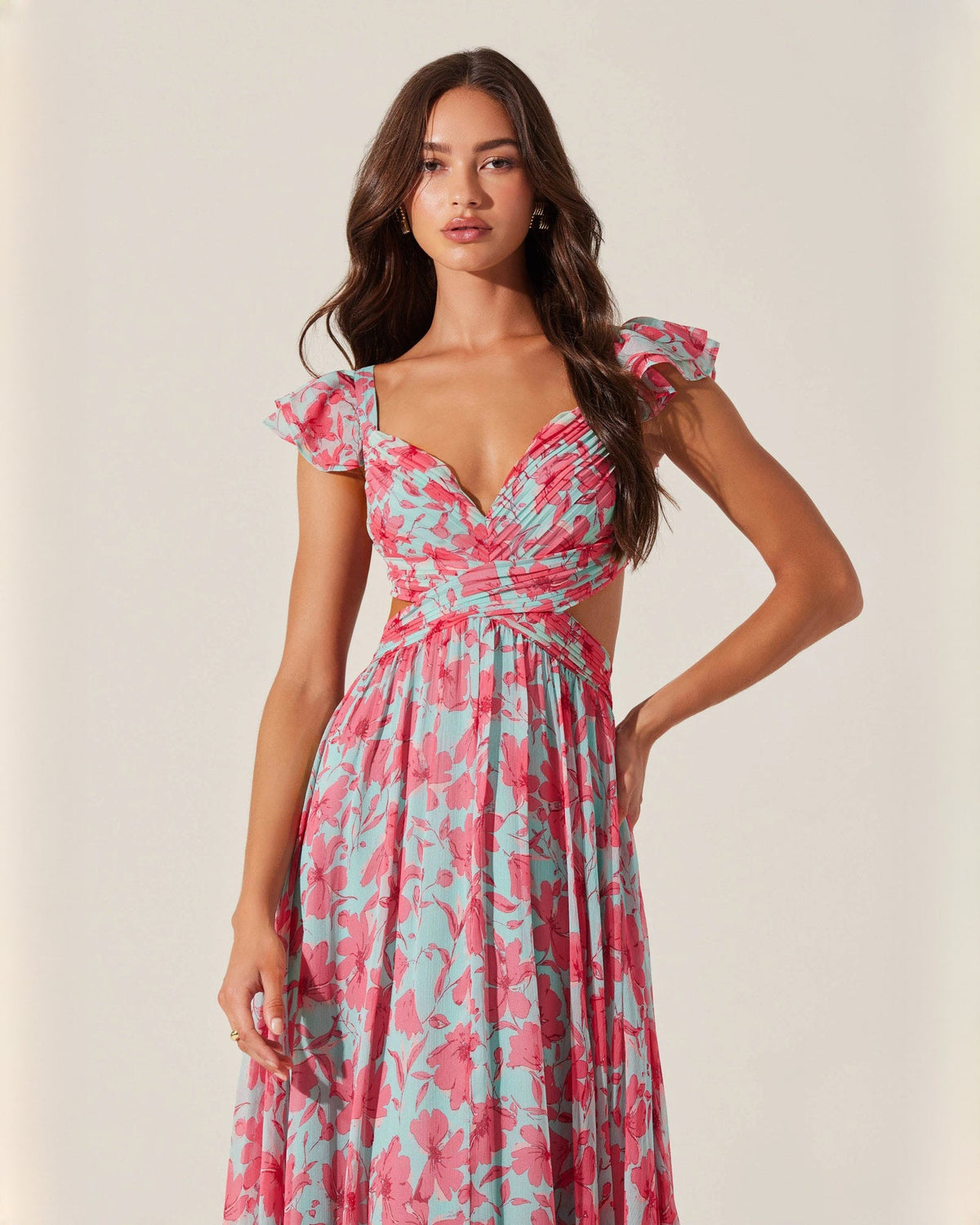 Sleeveless floral A-line maxi dress with V-neck and puffed shoulders, pink and teal