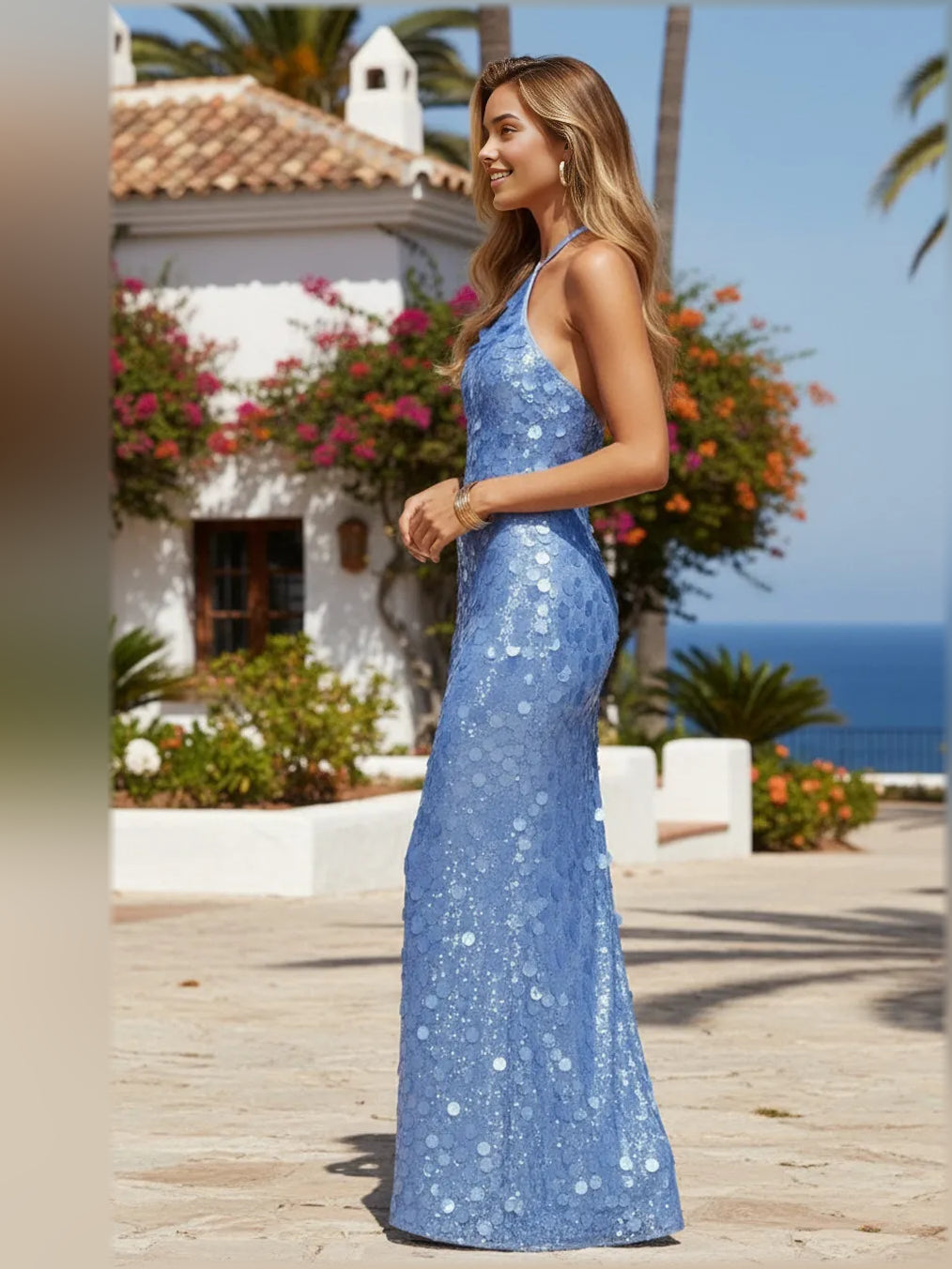 Blue sequin halter mermaid formal gown with open back, floor-length