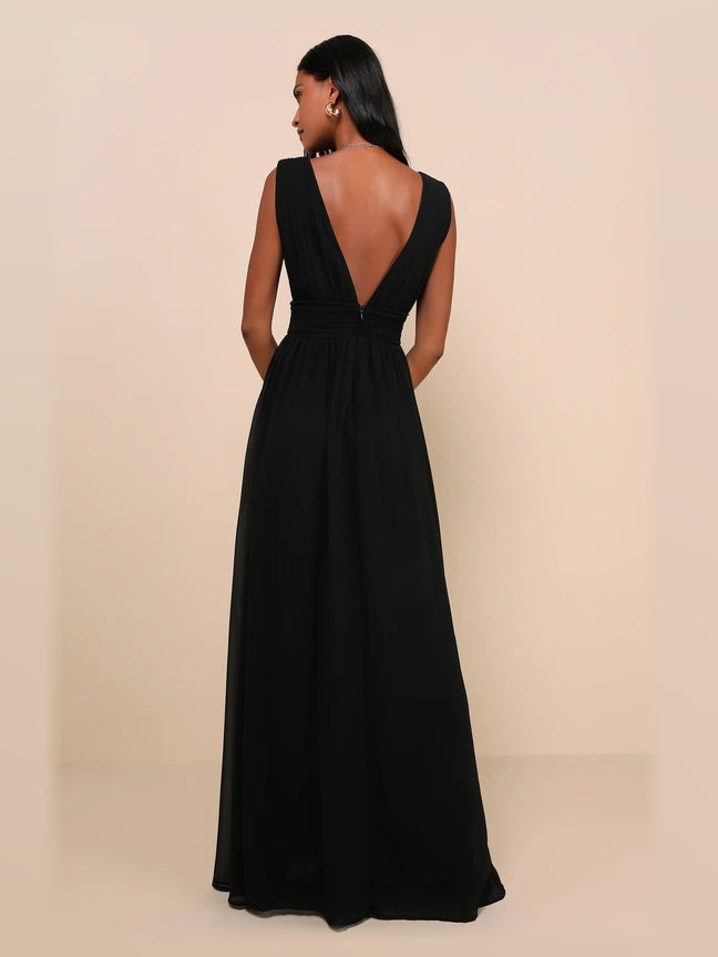 Black formal dress with structured woven fabric construction and maxi hem