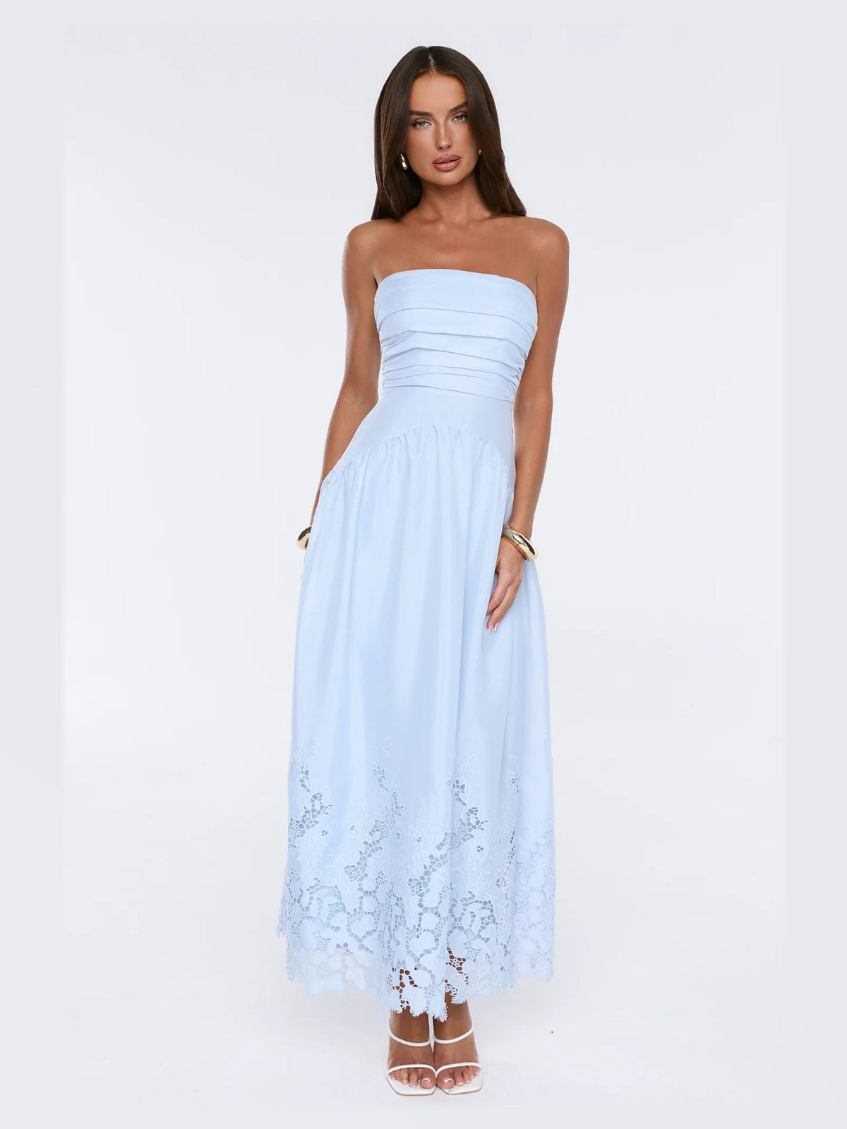 Blue formal dress with structured woven fabric construction and maxi hem