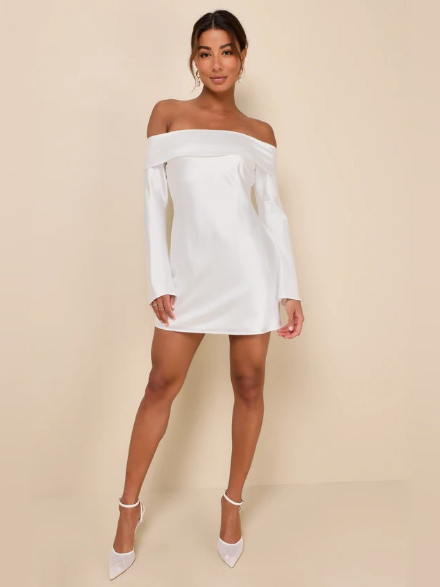 White off-shoulder satin mini dress with long sleeves and fitted, straight skirt