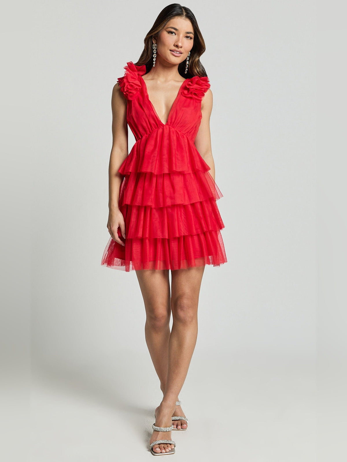 Red tiered tulle mini homecoming dress with deep V-neck and layered ruffle skirt