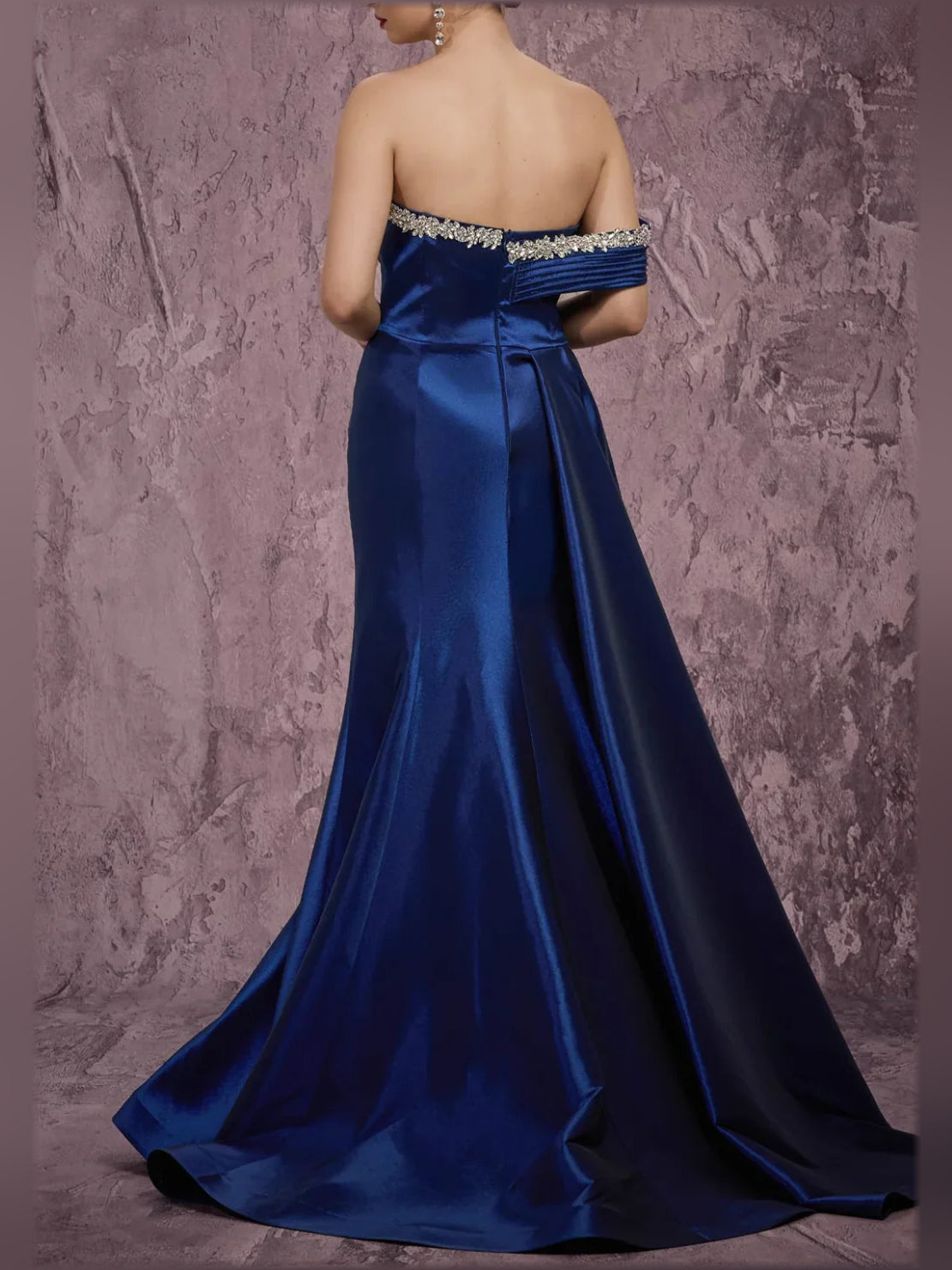 Backless navy satin formal gown with off-shoulder beaded top and lace-up back
