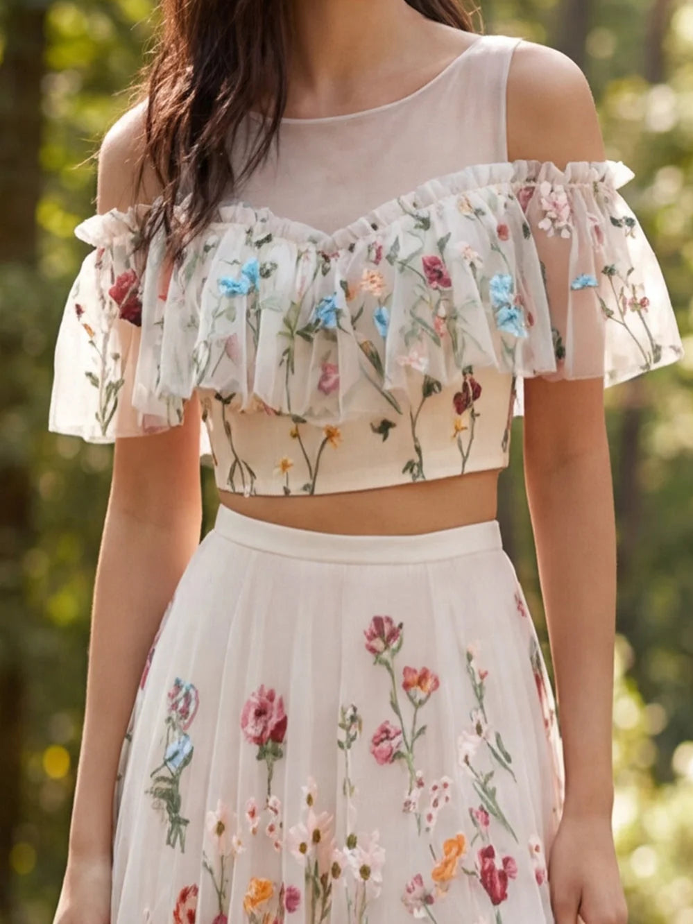 Ivory floral corset-style off-shoulder top with ruffled neckline and spaghetti straps
