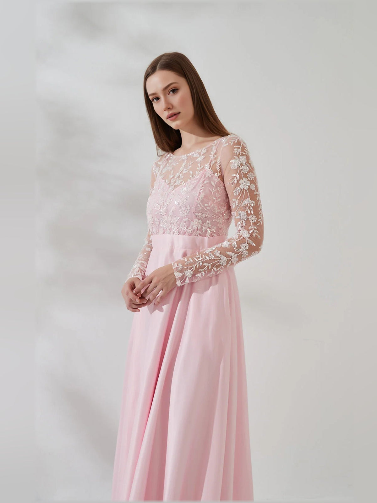 Light pink floral lace long-sleeve formal dress with sheer sleeves and fitted waist