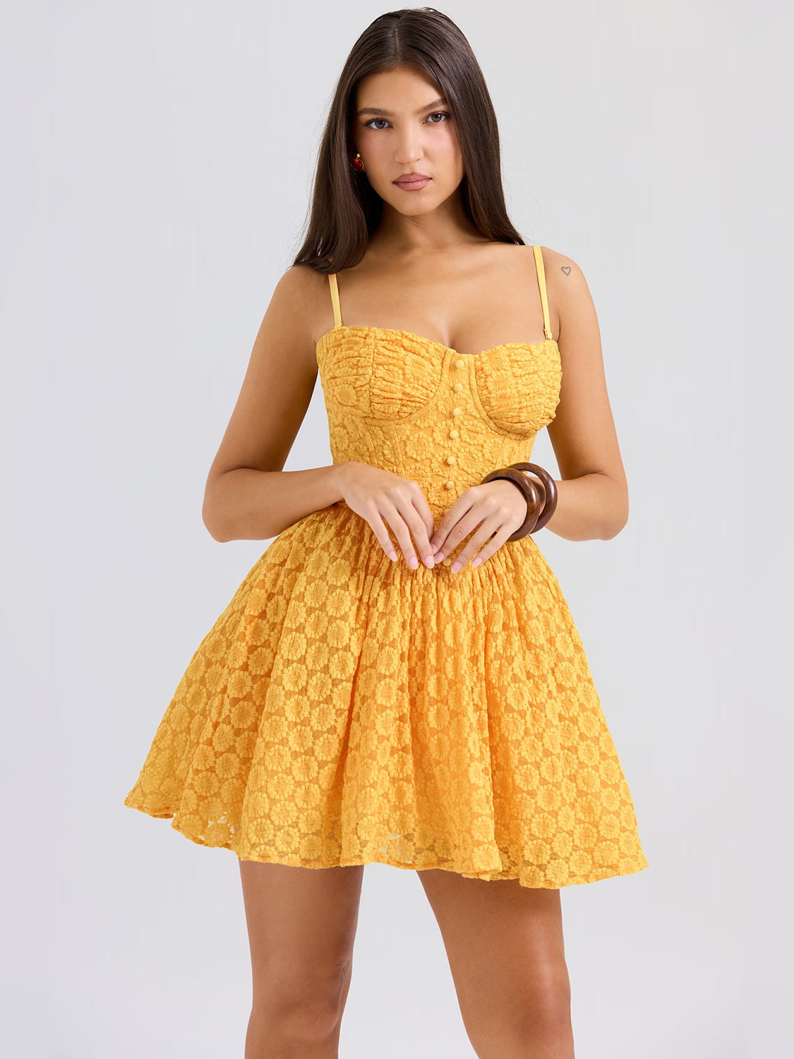 Apricot corset mini dress with sweetheart neckline, textured fabric, ruched bodice, short skirt