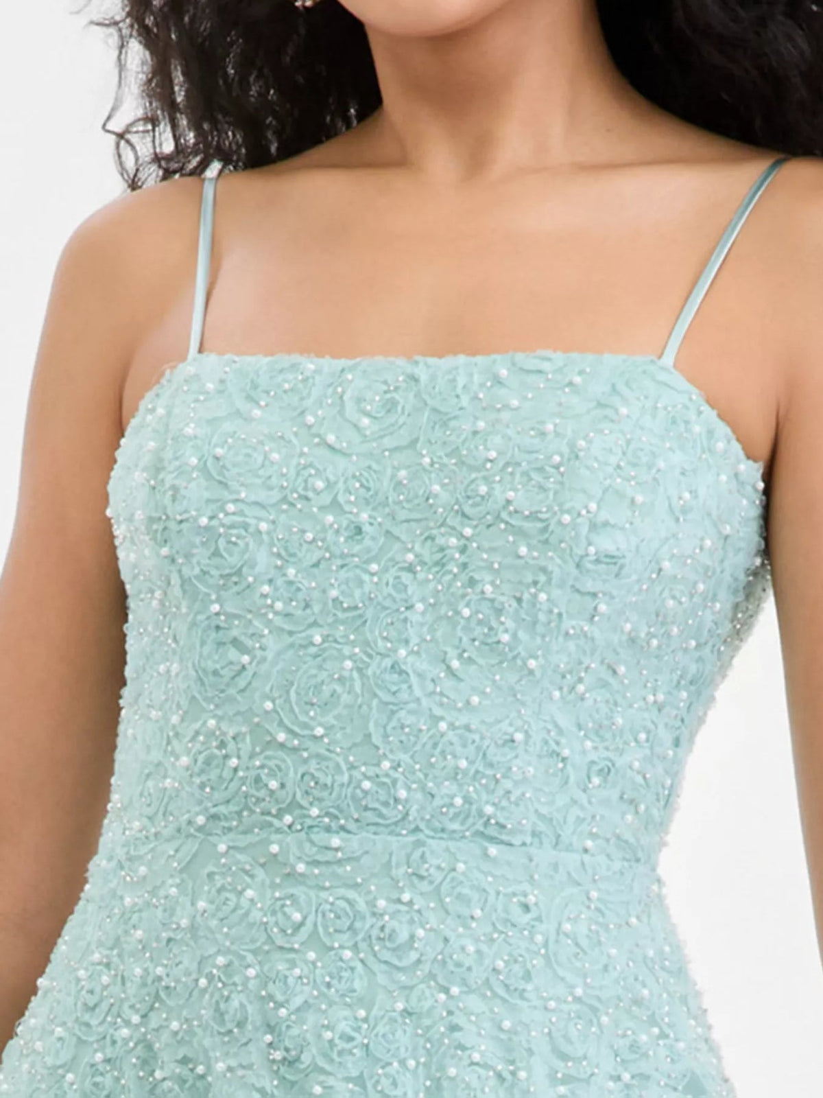 Mint green beaded bodice with square neckline and thin spaghetti straps