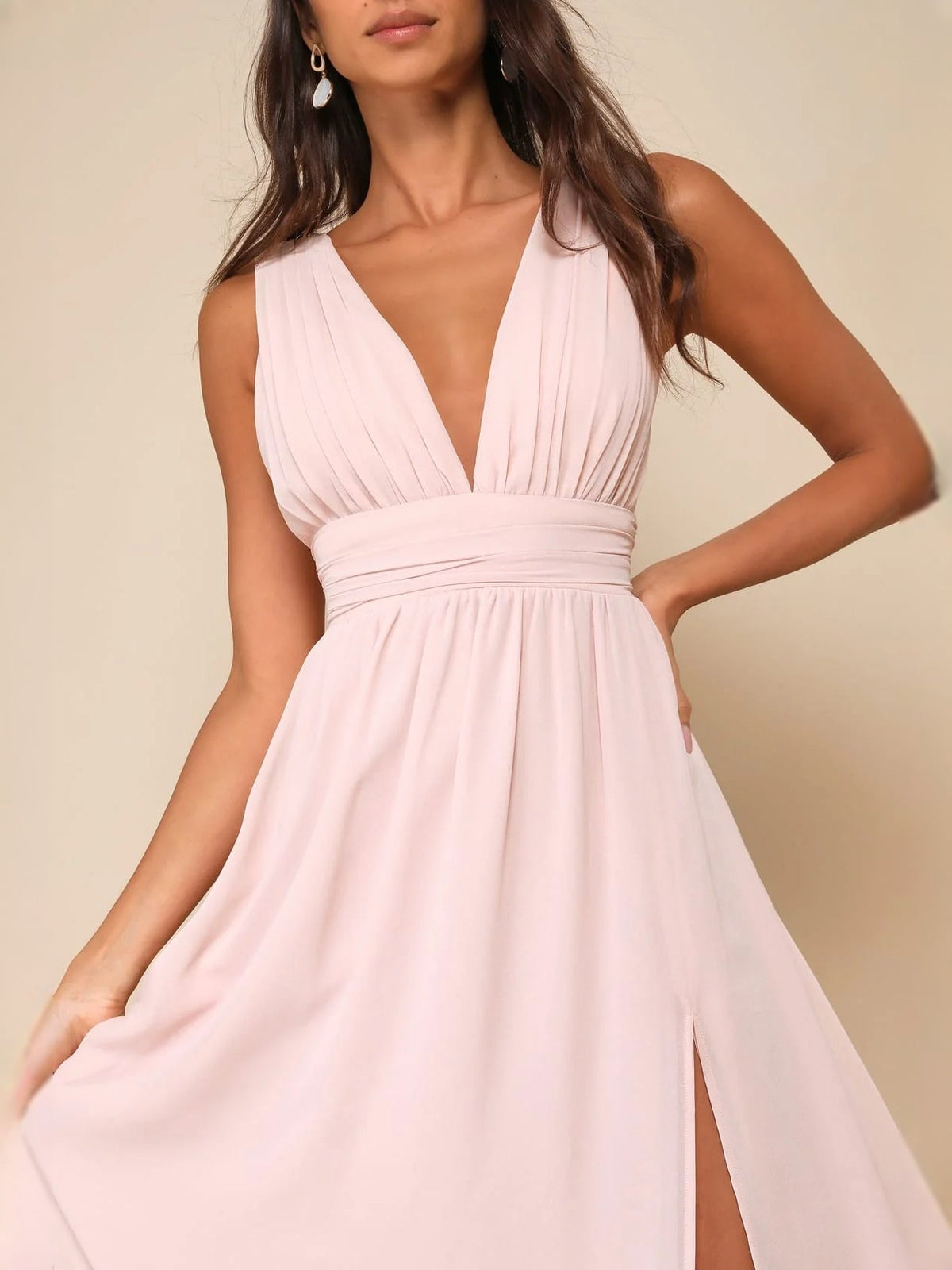 Light pink V-neck maxi dress with ruched bodice and gathered waist detail