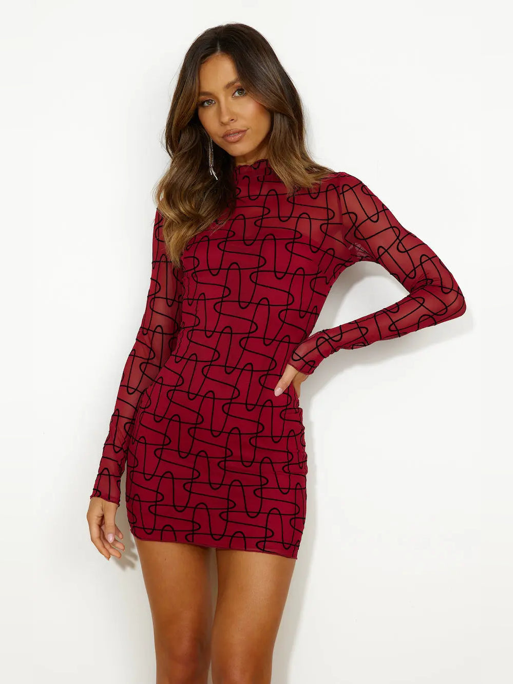 Maroon mini homecoming dress with high neck and long sleeves, black line pattern design.