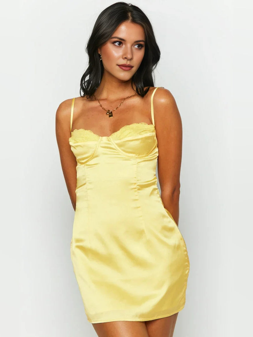 Yellow satin mini dress with ruched bodice and sweetheart neckline on thin straps