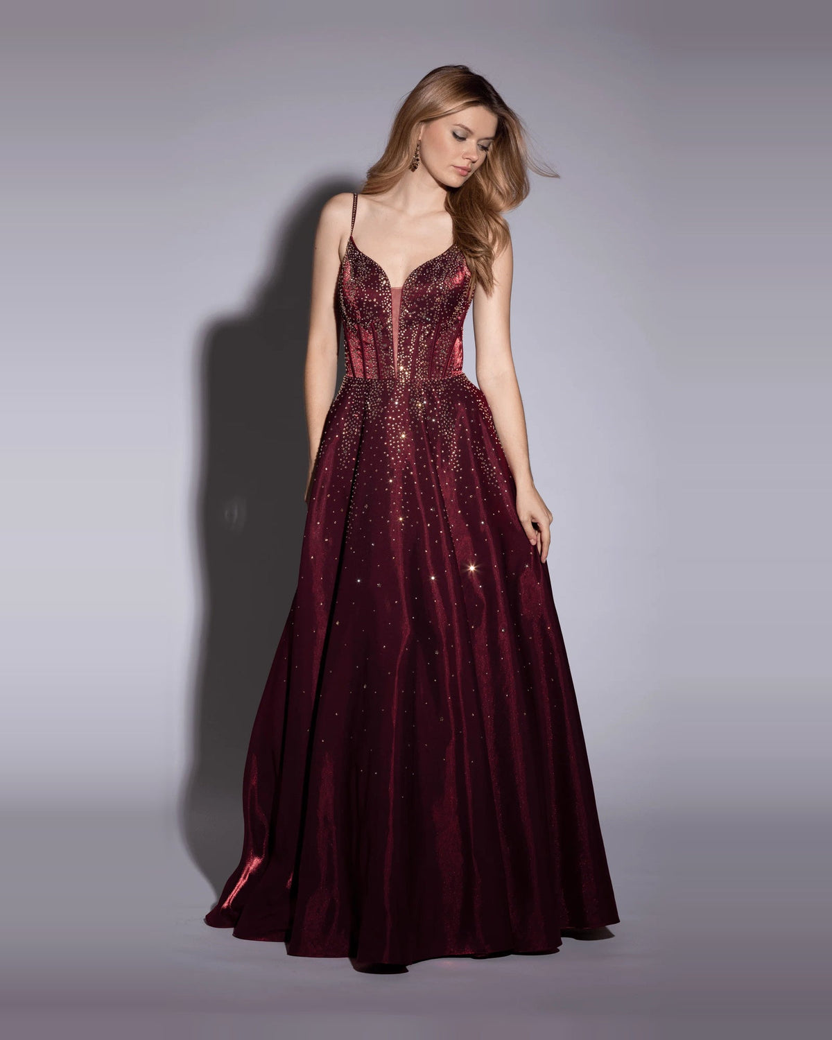 Burgundy sequin corset ball-gown prom dress with sweetheart neckline and full skirt