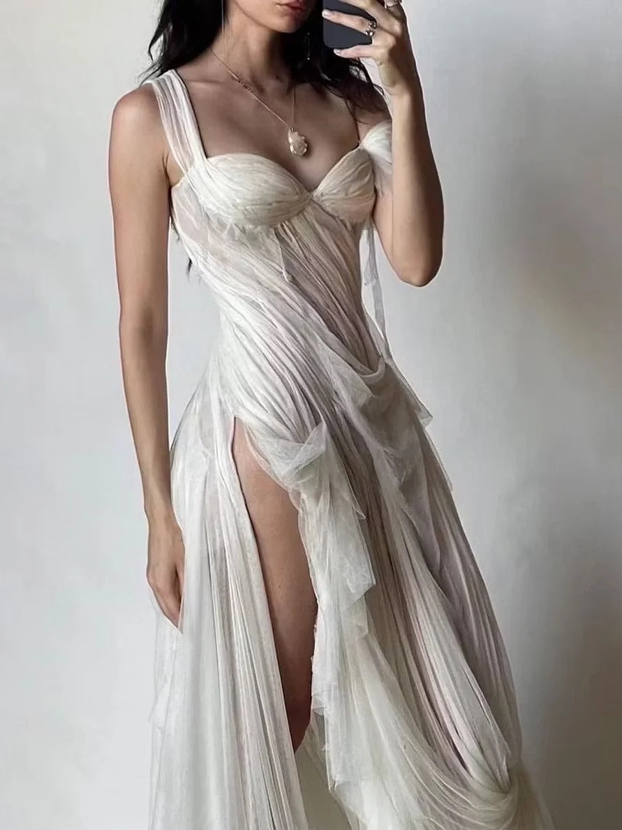 Ivory sweetheart prom maxi dress with draped ruching, layered skirt, and thigh slit