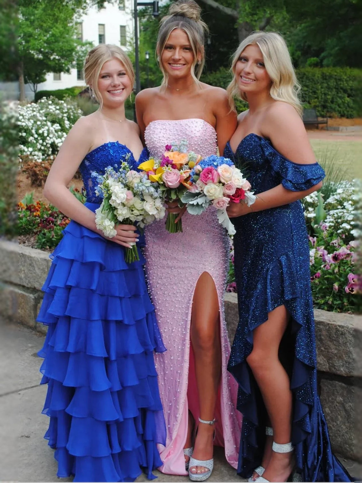 Pink strapless beaded mermaid prom dress with corset bodice and front thigh slit