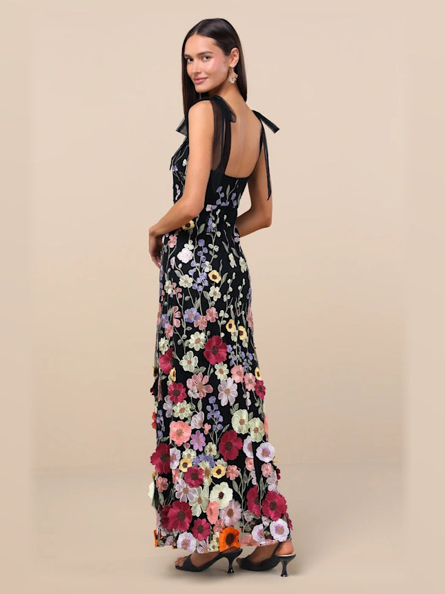 Black formal dress with mesh construction and maxi hem