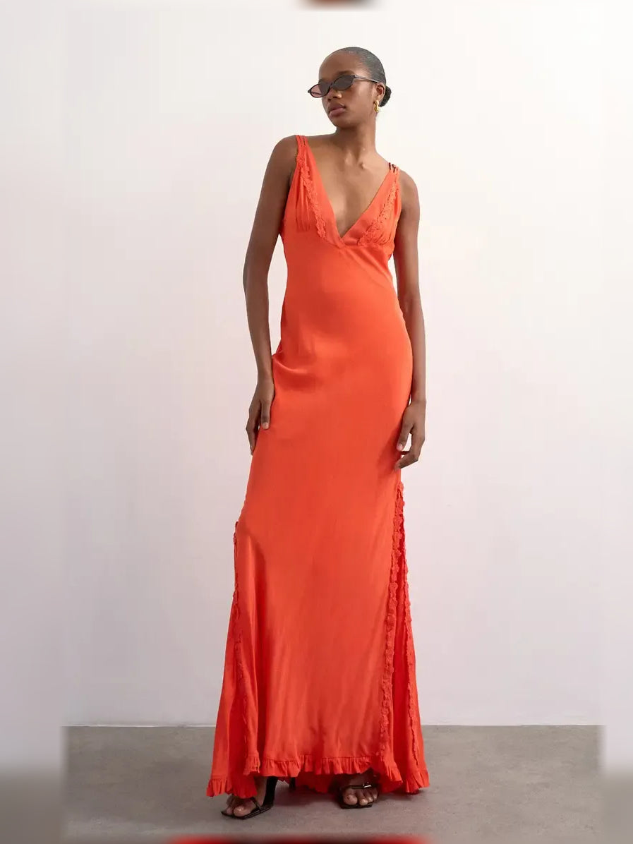 Orange V-neck spaghetti strap ruffle floor-length formal dress with scalloped hem.