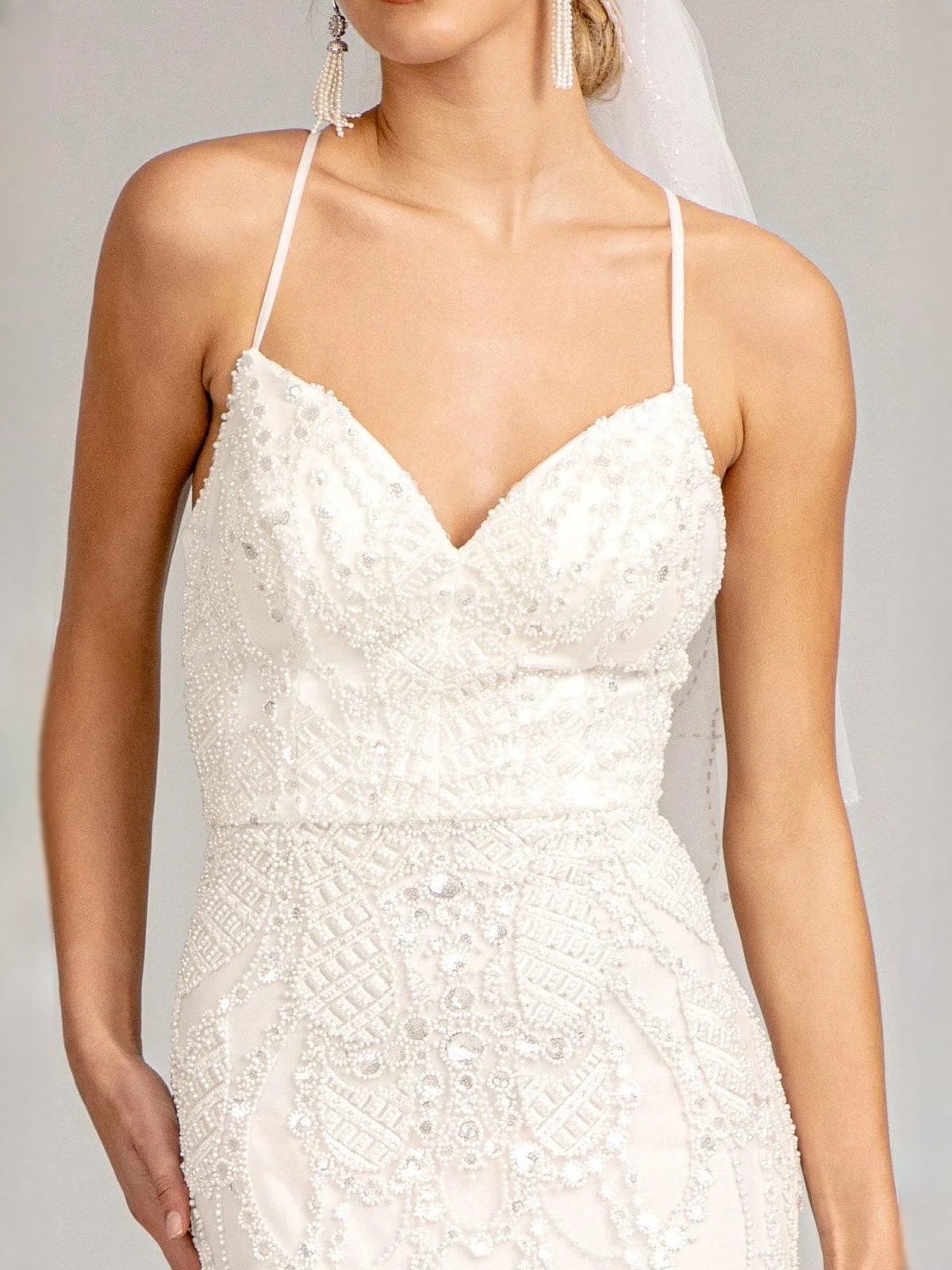 Ivory beaded lace v-neck bodice with thin spaghetti straps on mermaid dress