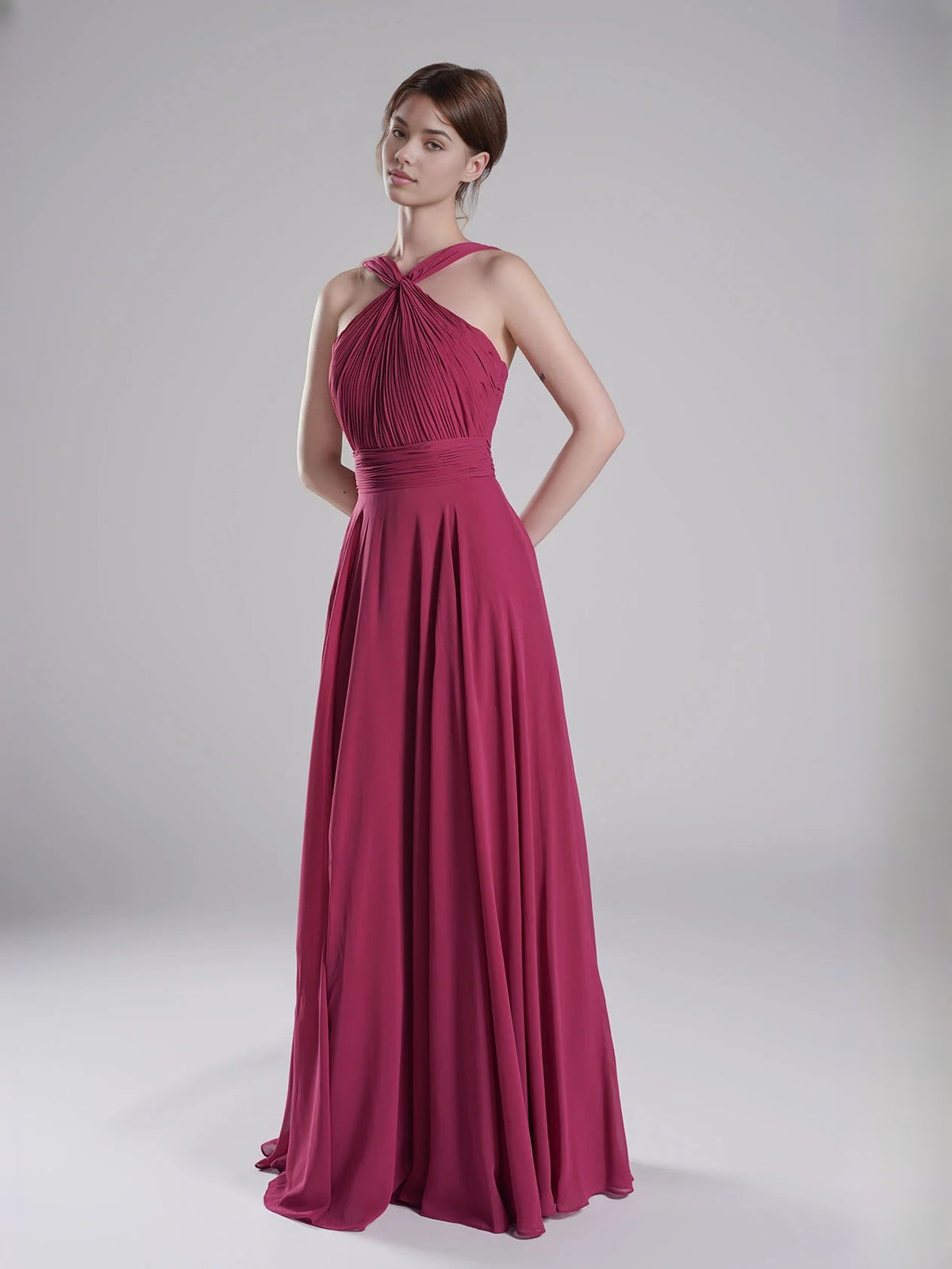 Fuchsia halter-neck chiffon A-line bridesmaid dress with pleated bodice and full skirt