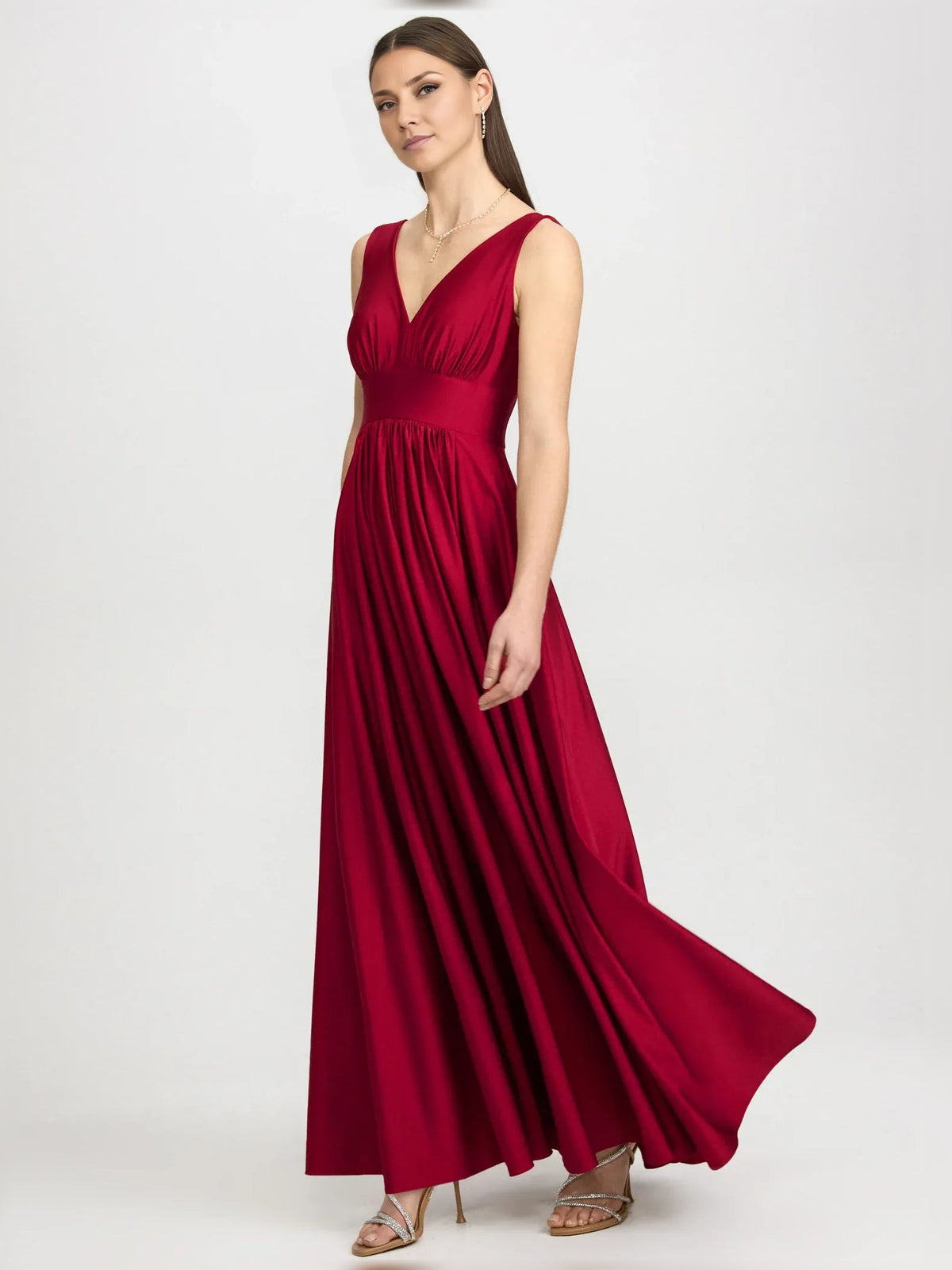 Red V-neck ruched floor-length formal dress with side slit and sleeveless bodice