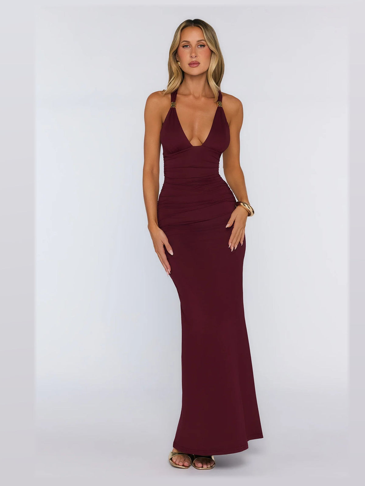 Burgundy formal dress with structured woven fabric construction and maxi hem
