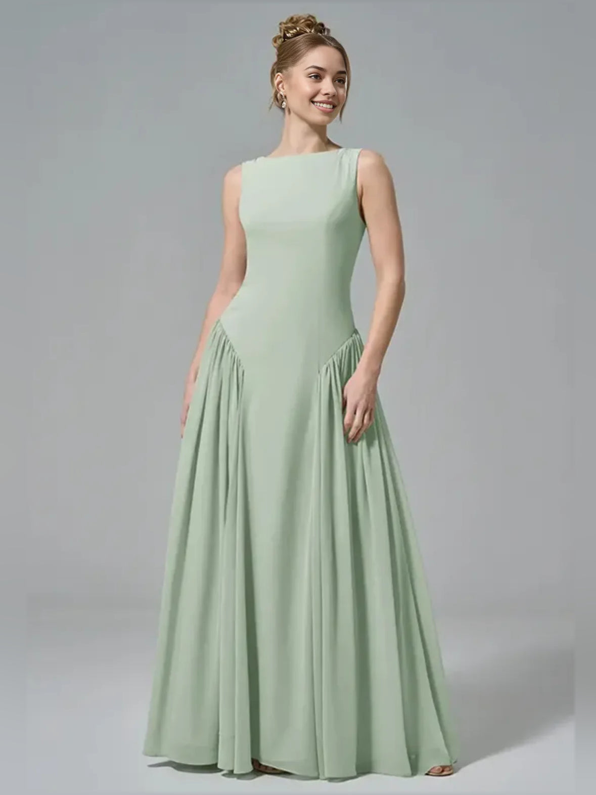 Mint green chiffon A-line dress with boat neck and gathered skirt, sleeveless.