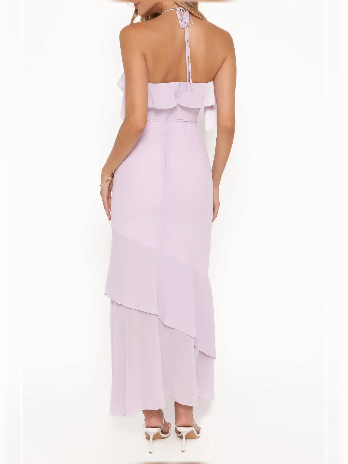 Back view of lilac halter neck tiered ruffle midi dress with open back straps