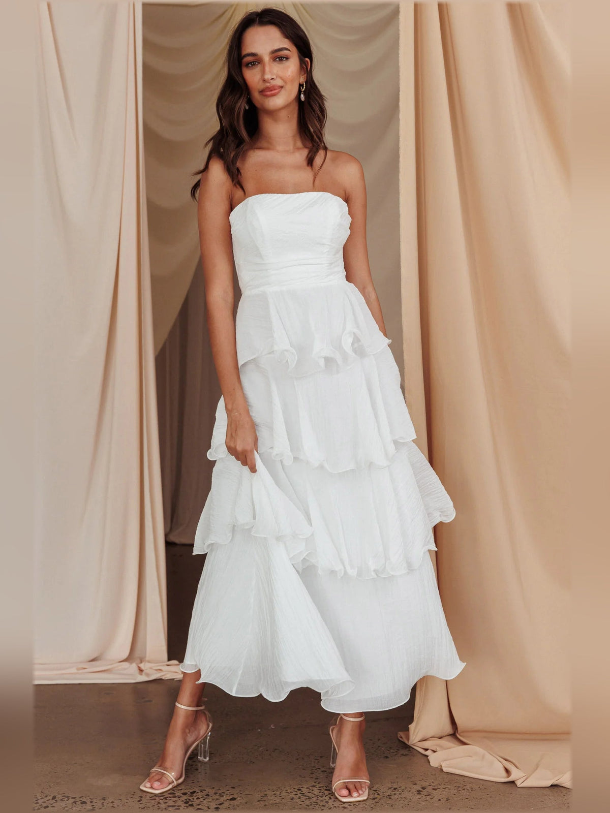 Off-white strapless layered midi dress with tiered ruffles, front view