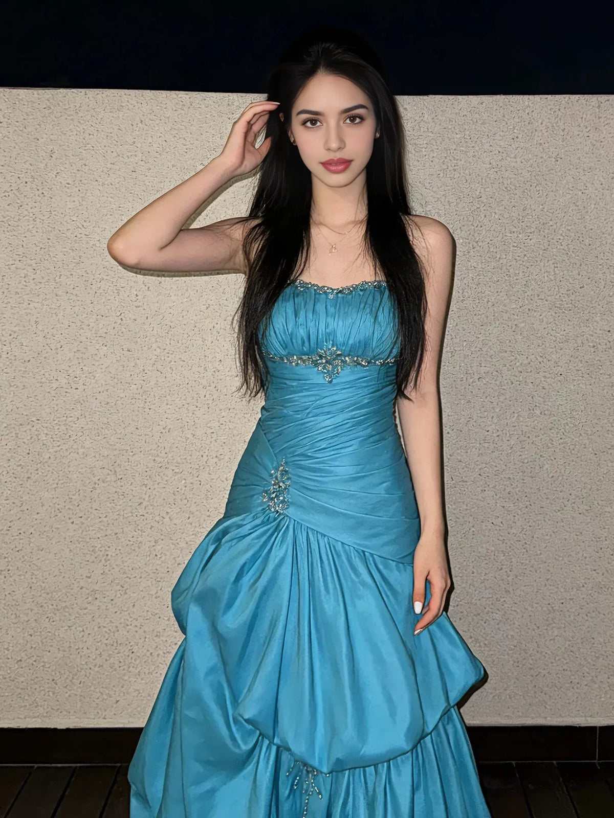Teal ruched sweetheart bodice prom dress with jeweled waist detail and layered skirt