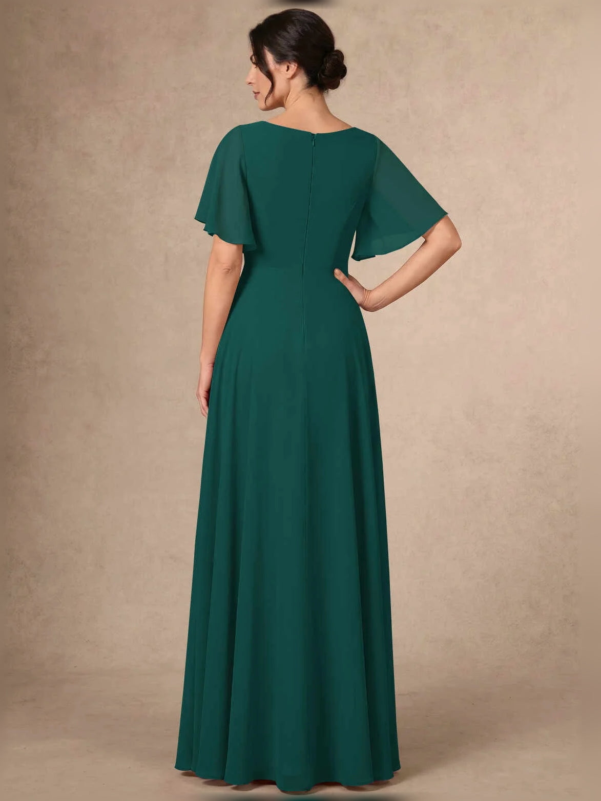 Dark green sequin A-line maxi chiffon dress, back view with flutter sleeves