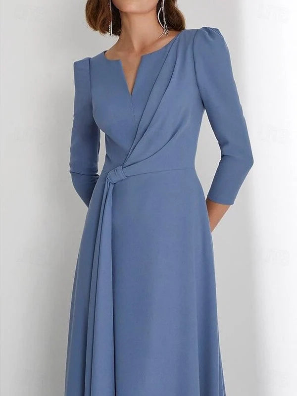 Steel blue draped V-neck A-line gown with wrap waist and 3/4 sleeves, front detail