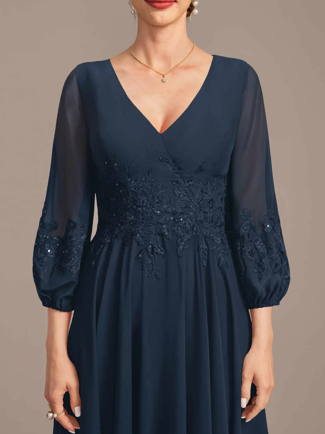 Dark navy V-neck A-line chiffon dress with beaded bodice and puffed sheer sleeves