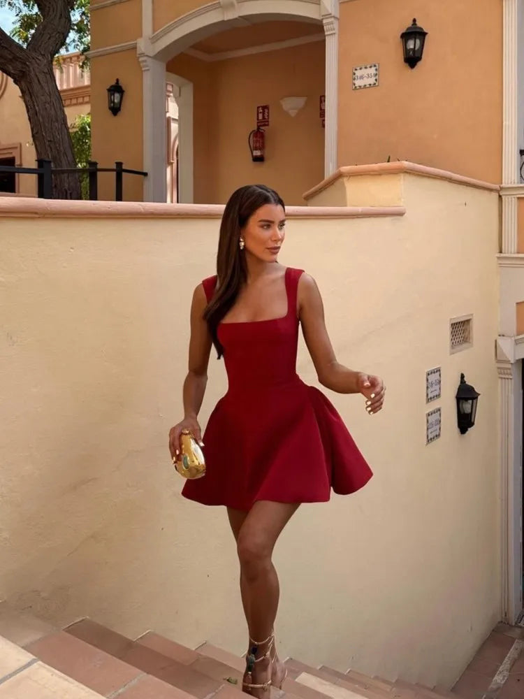 Red square-neck fit-and-flare mini dress with thin straps and swingy flared skirt