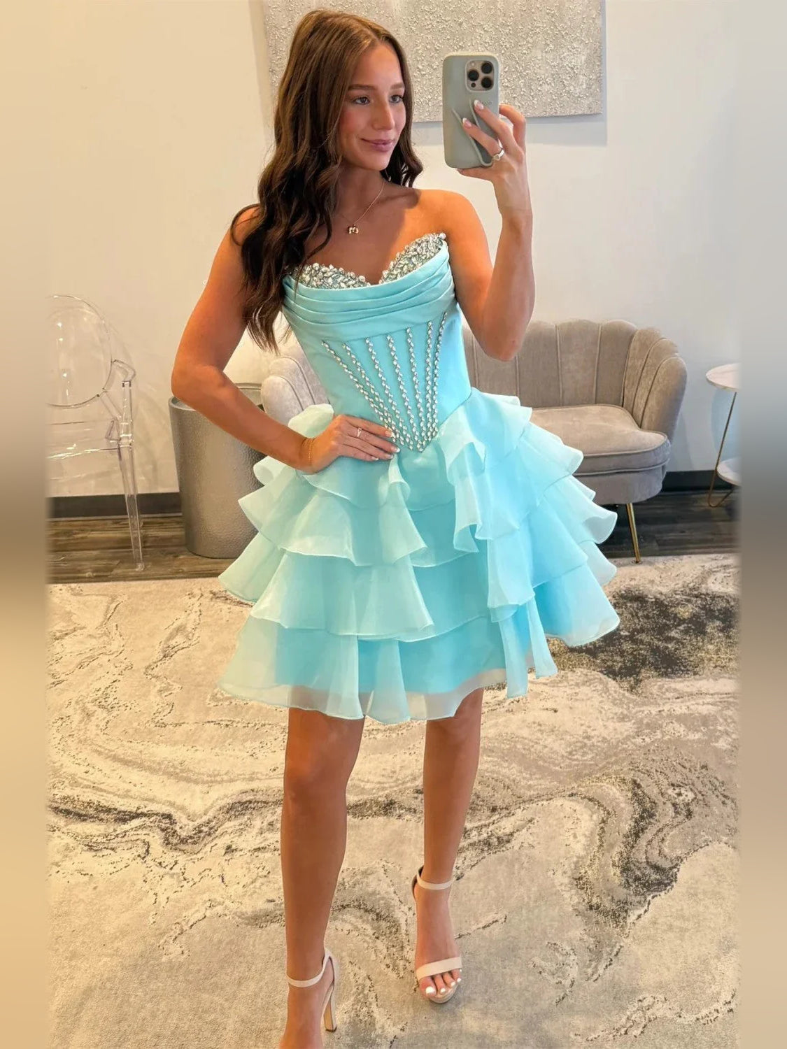 Ice blue corset bodice mini dress with sweetheart neckline and tiered ruffle skirt